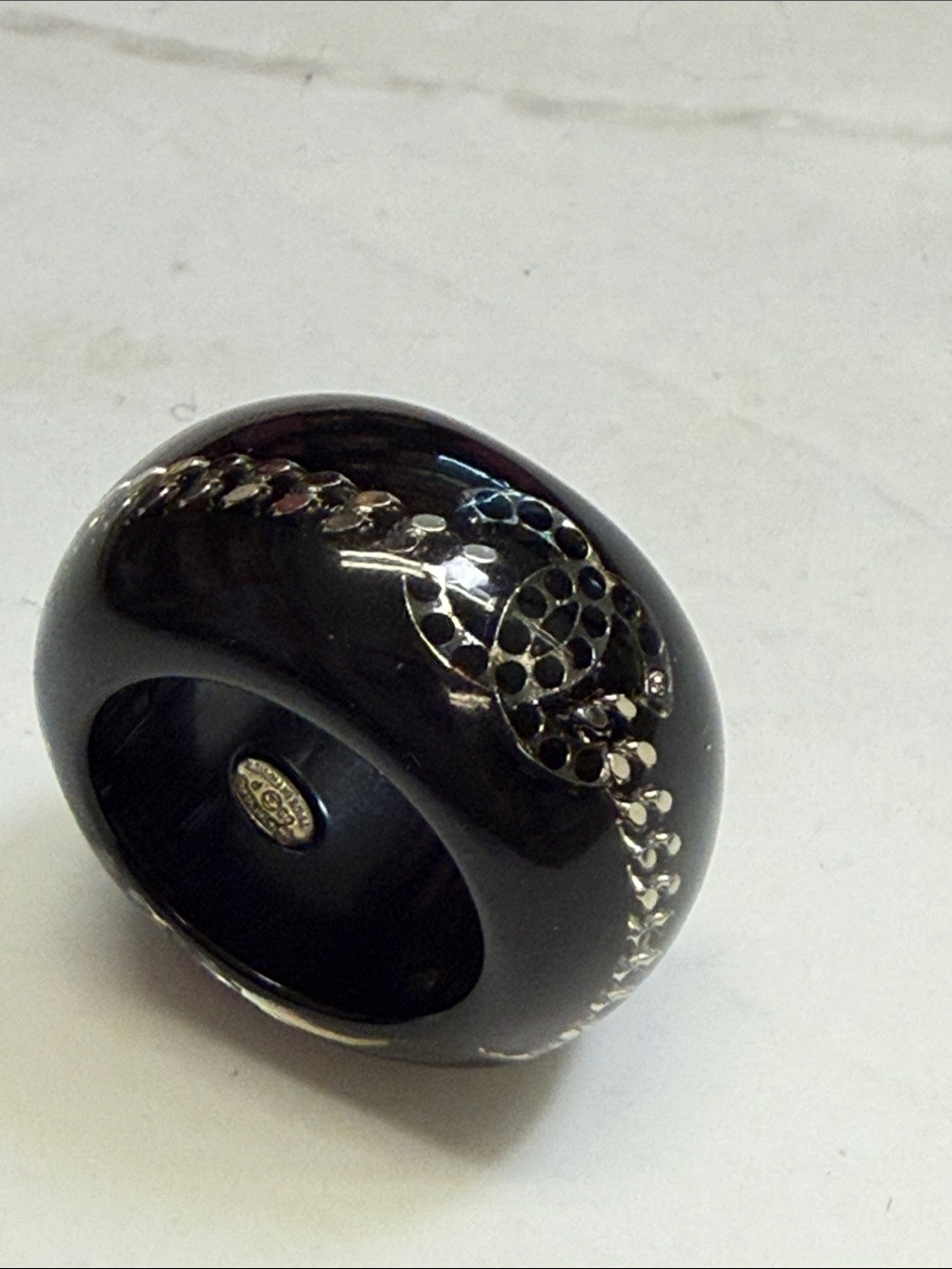 CHANEL Black Resin Dome Ring with Silver Motif